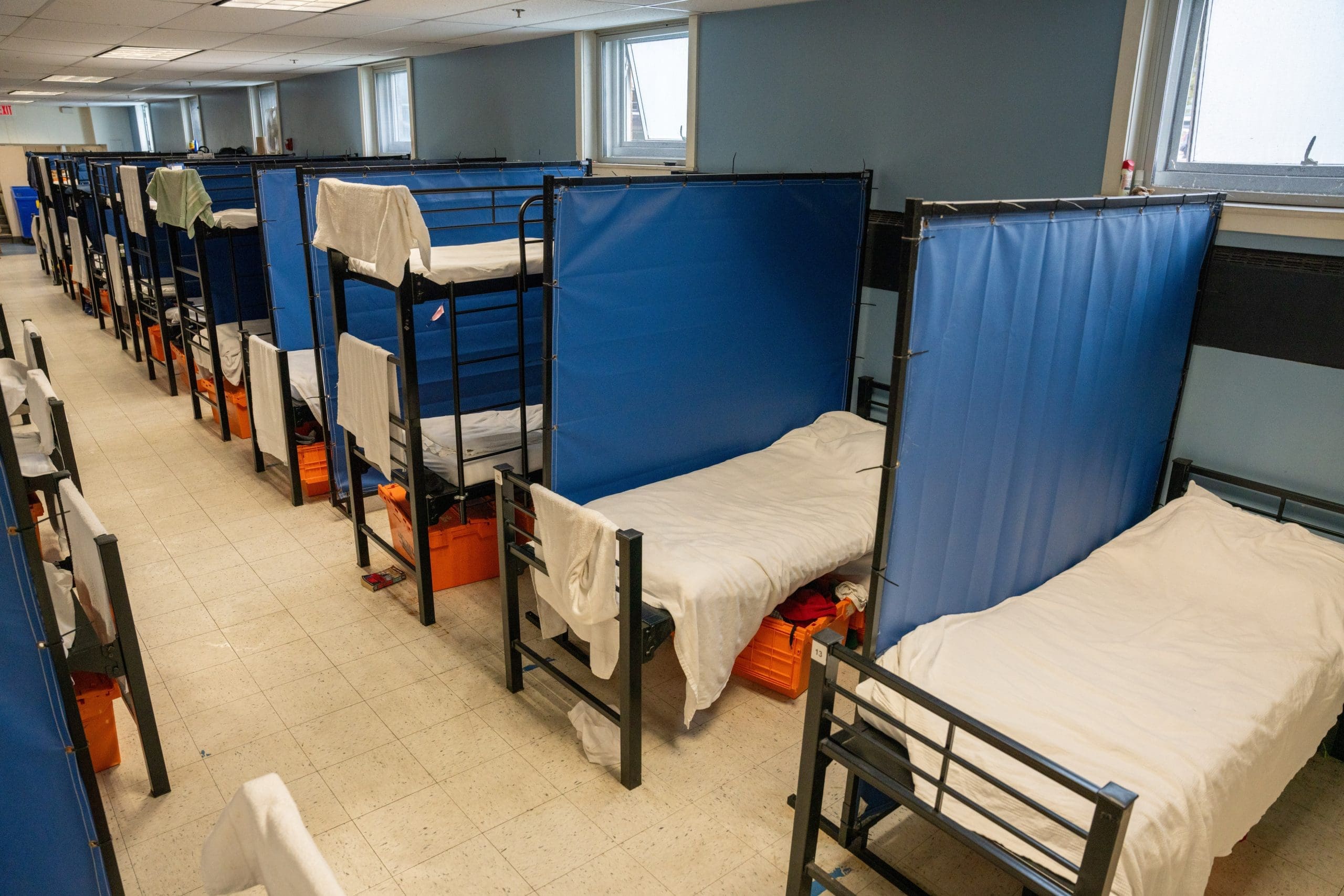 A group of guests embrace at "Together for Women"