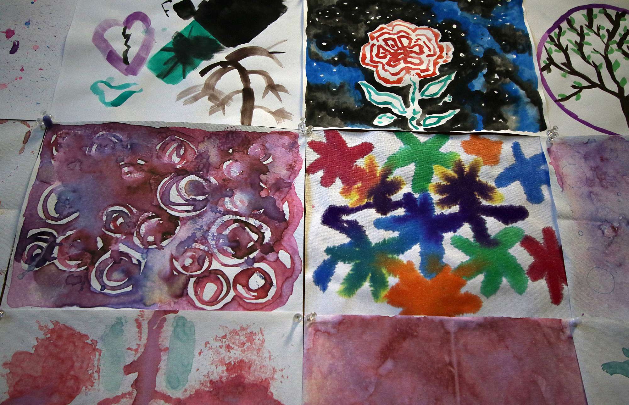 A group of guests embrace at "Together for Women"