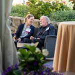 Photo of guests talking to one another at Breaking Bread, Building Hope
