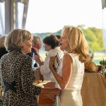 Guests mingle at Breaking Bread, Building Hope
