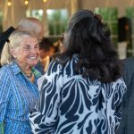 Honoree and Kitchen Manager Karen Andrew and guest talk at Breaking Bread, Building Hope.