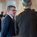 Lifebridge Vice President Dr. Jonathan Lukens, PhD talks to a guest at Breaking Bread, Building Hope