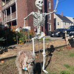 A skeleton and scary mask decorating the Seeds of Hope community garden at Lifebridge's Salem campus