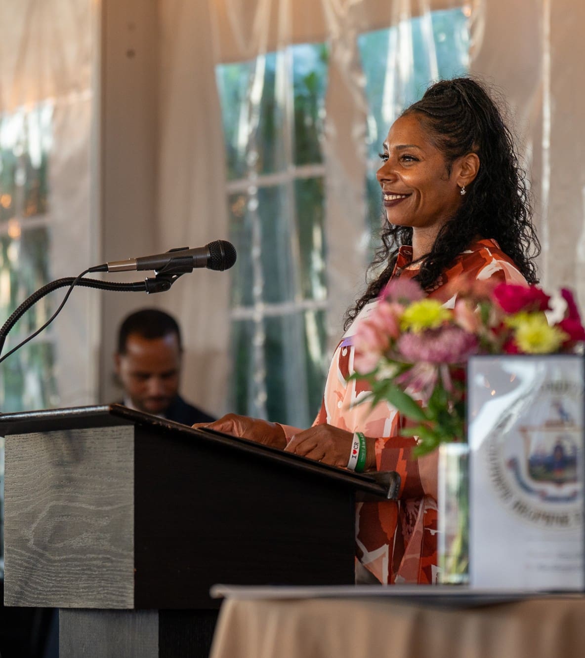 Williams speaking at Breaking Bread, Building Hope in Fall 2025